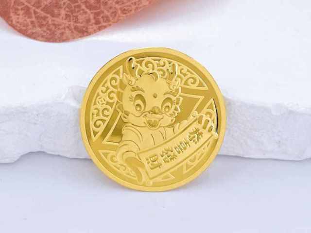 金价收跌0.42% 美联储副主席“暂不加息”定调